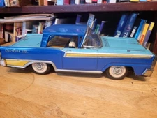 NICE  BLUE ET  TIN LITHO  FRICTION POWERED  1959 FORD FAIRLANE 500