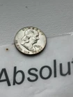 1957 Franklin Half Dollar — 90% Silver — Philadelphia (No Mint Mark) — Circulate