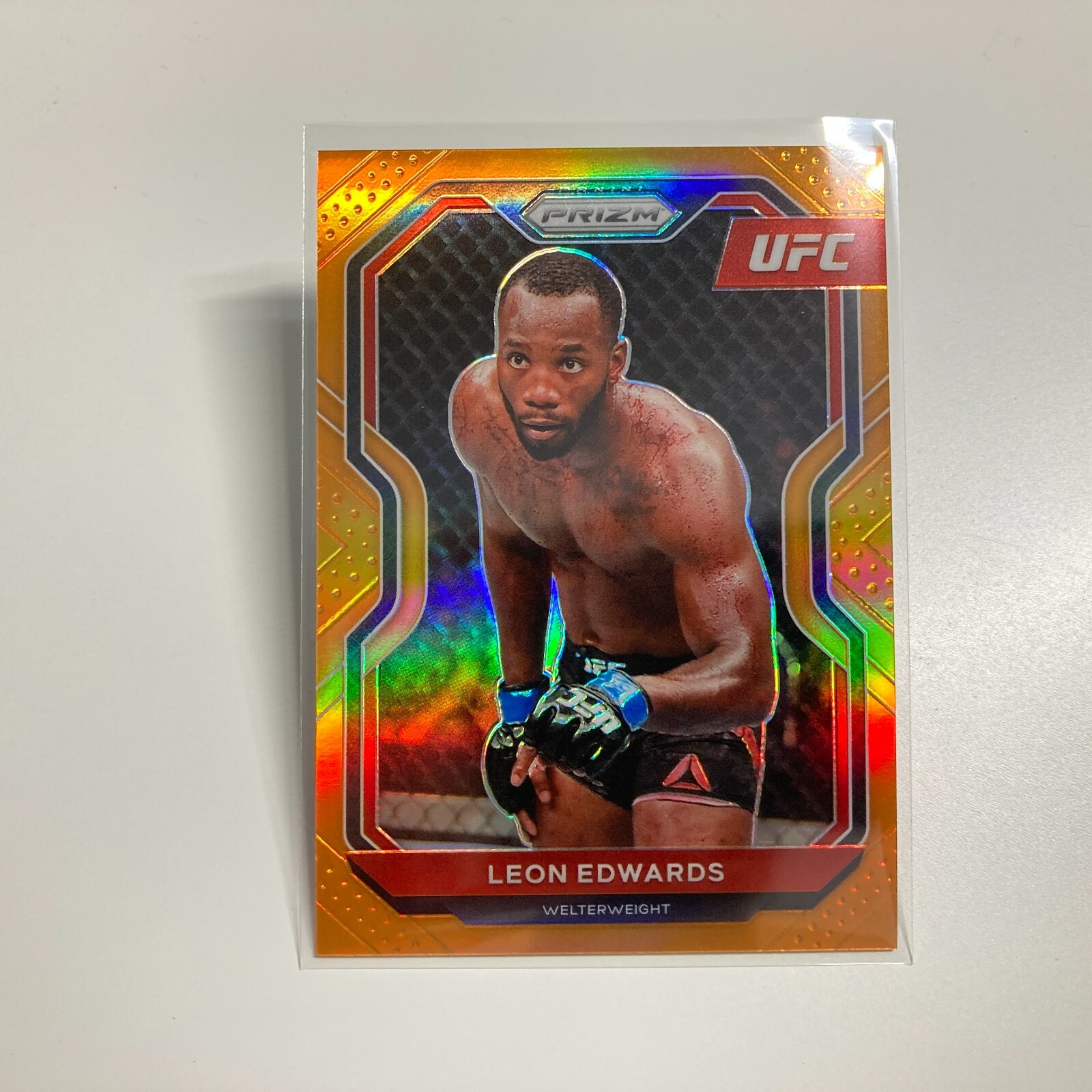 Leon Edwards 2021 Panini Prizm UFC Orange Refractor Card 73/99 #17