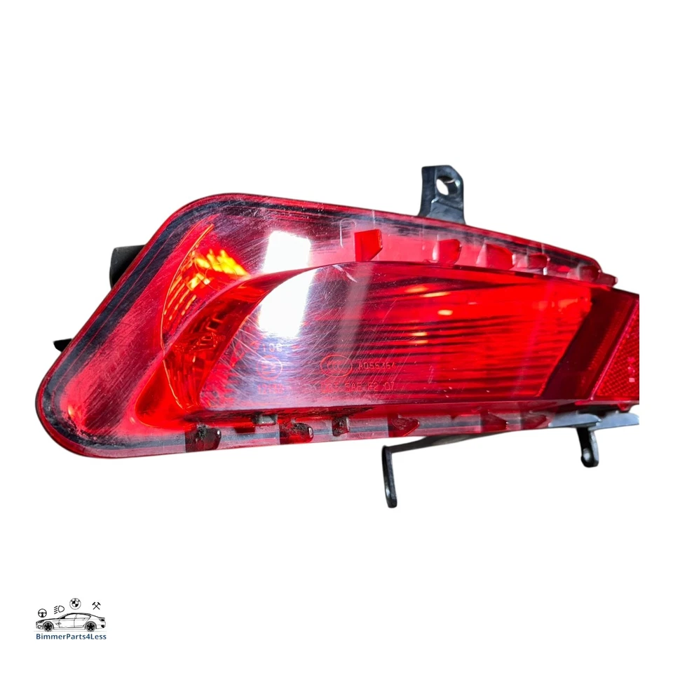 Luz antiniebla parachoques trasero pasajero izquierdo Volvo XC60 2013-2016 lado cercano N/S OEM Foto 2 de 4