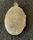 Silver Tone Locket With Flower Details — photo 2