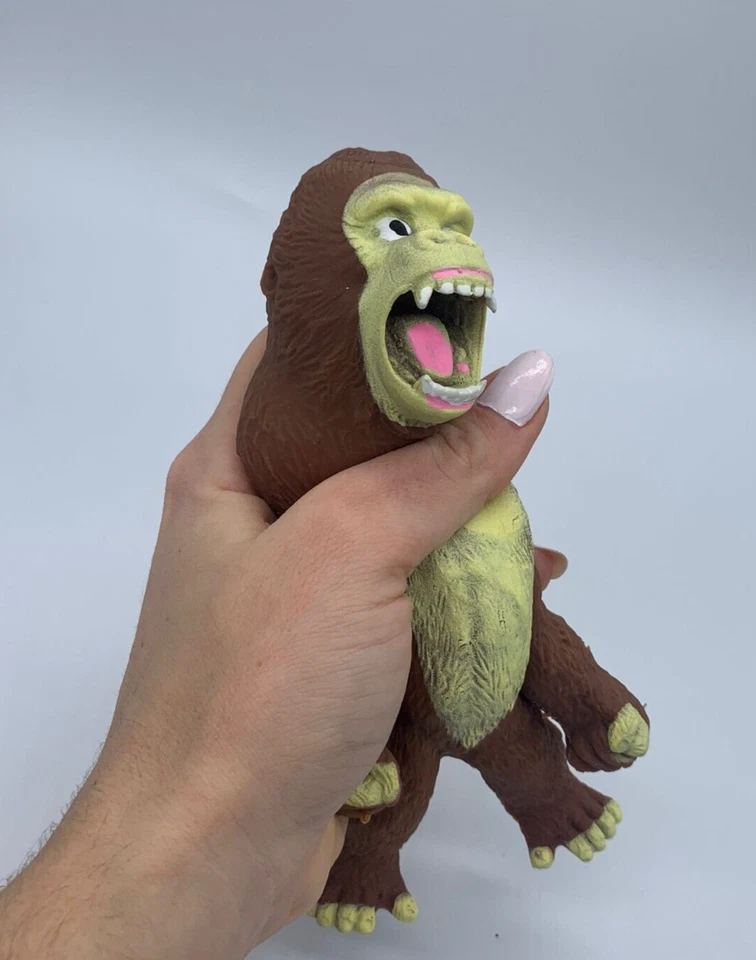 Liberación de Estrés y Ansiedad - Terapia de Manos Mono Marrón y Verde Foto 4 de 4