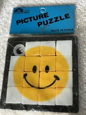 Vtg Smiley Smile Happy Face Hippie Slide Puzzle Plastic Toy in Package 90’s