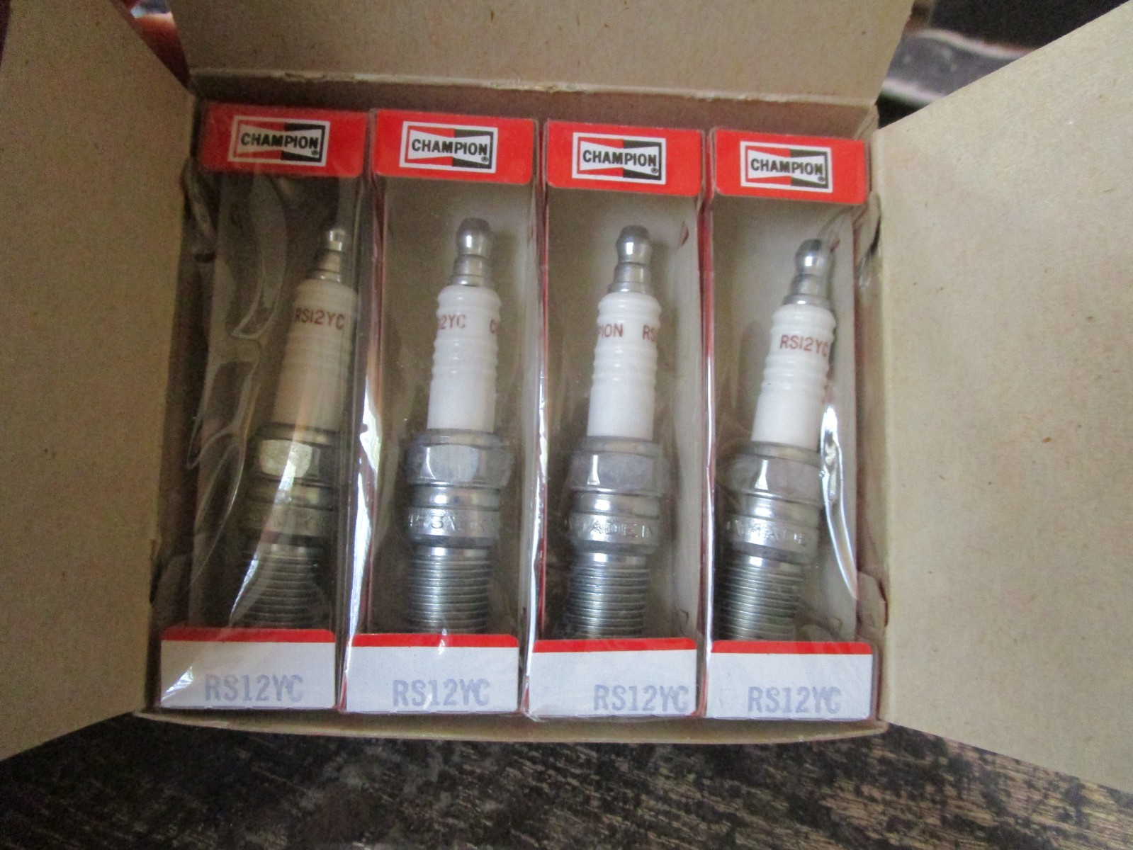 4 New Old Stock Champion Copper Plus RS12YC Spark Plugs USA