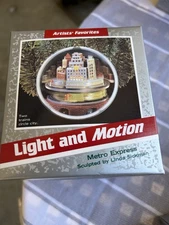 Hallmark Keepsake LIGHT AND MOTION Ornament in Original Box Vintage Metro Expres