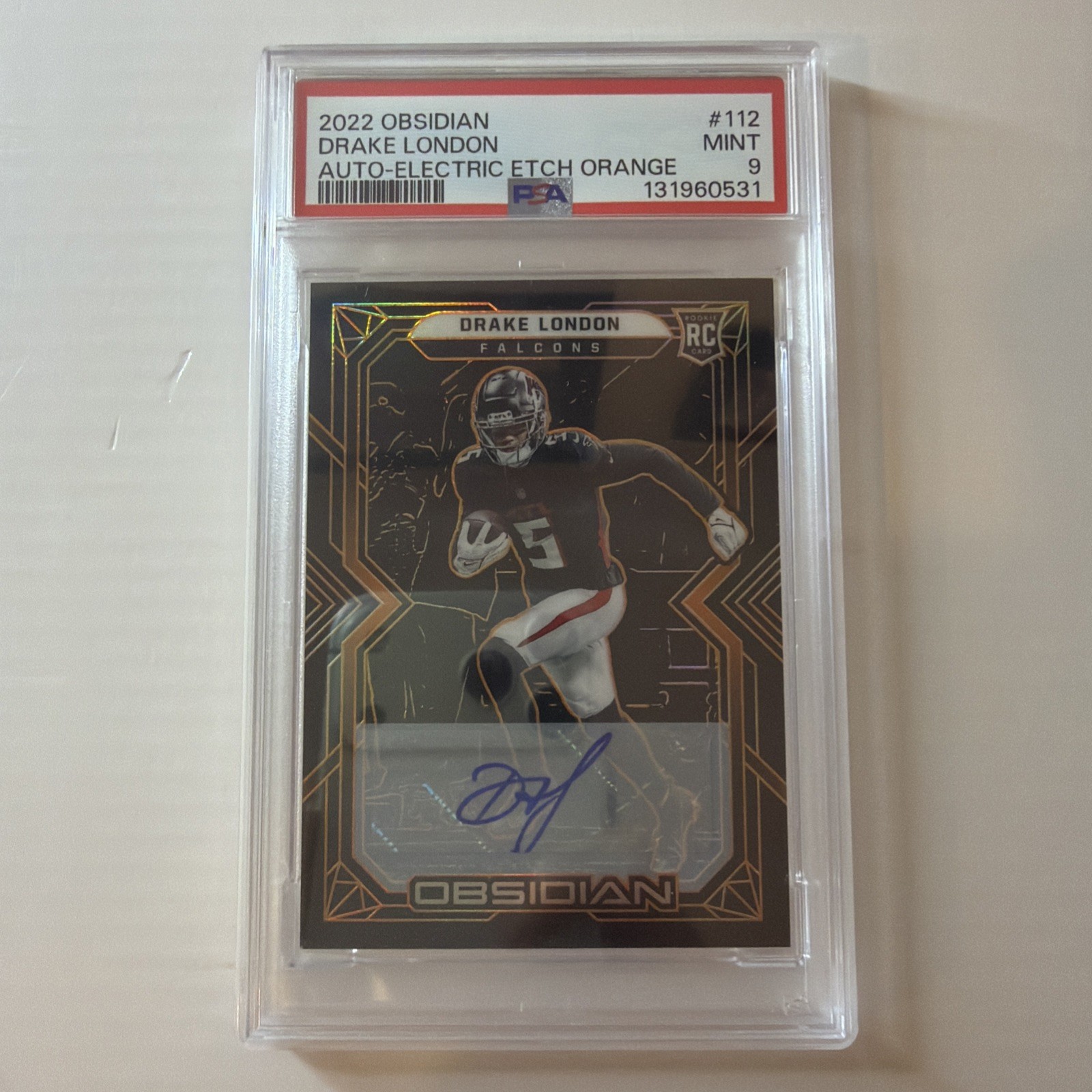 DRAKE LONDON RC AUTO 2022 OBSIDIAN ELECTRIC ETCH ORANGE ROOKIE /75 PSA 9