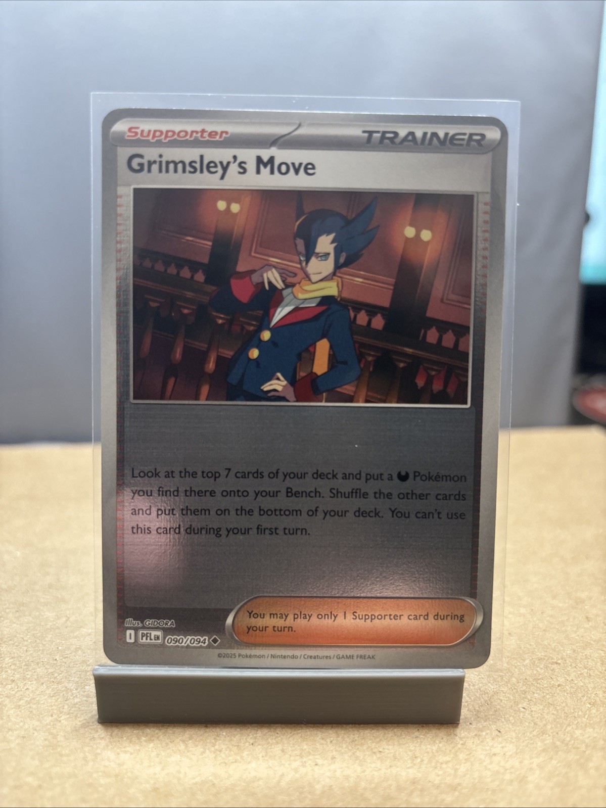 Grimsley's Move 090/094 Me02: Phantasmal Flames Reverse Holo