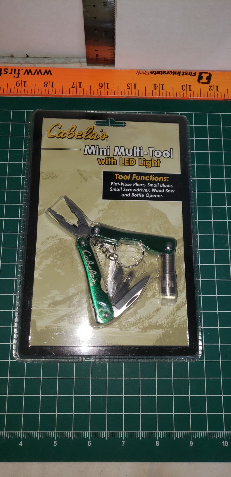 Brand New Cabela's Mini Multi-Tool with LED Light & Case….