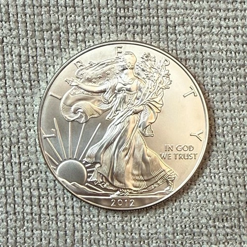 2012 American Silver Eagle 1 oz .999 Fine Silver $1 BU – In Plastic Sleeve