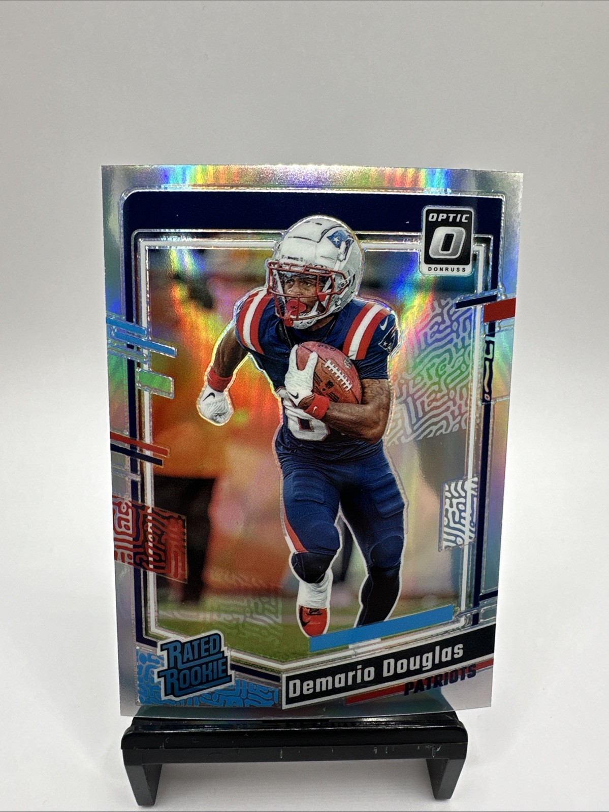 Demario Douglas 2023 Donruss Optic #300 Holo RC New England Patriots A1