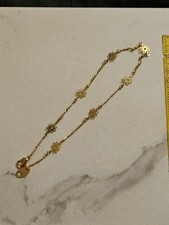 vintage Avon sunflower charm anklet in a gold-tone finish 10"