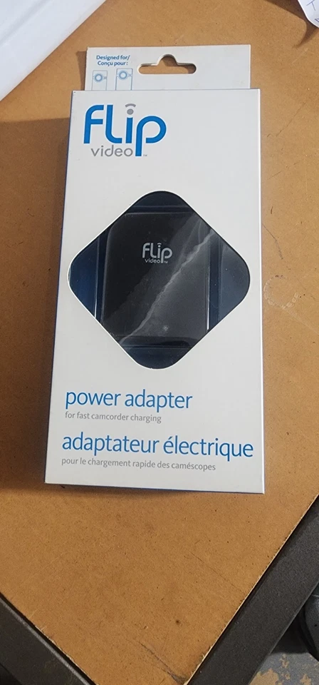 Nuevo adaptador de corriente Flip Video APA1B para carga rápida de videocámara Foto 3 de 4