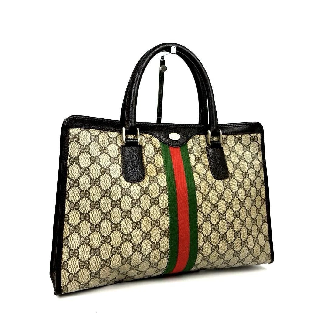 Sac fourre tout Gucci GG Supreme cuir marron quincaillerie dorée unisexe 11,1