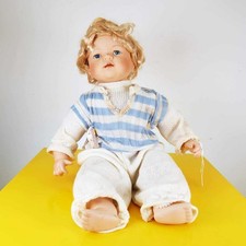 bambola vintage con viso mani e piedi in ceramica