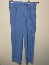 USED PRADA ARCHIVE LIGHT BLUE SLACKS JERSEY SIZE 48. THE COLOR IS AN INTERMEDI