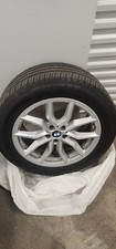 BMW X5 G05 X6 G06 19" wheels with Bridgestone Alenza Sport 265/50 R19 tires.