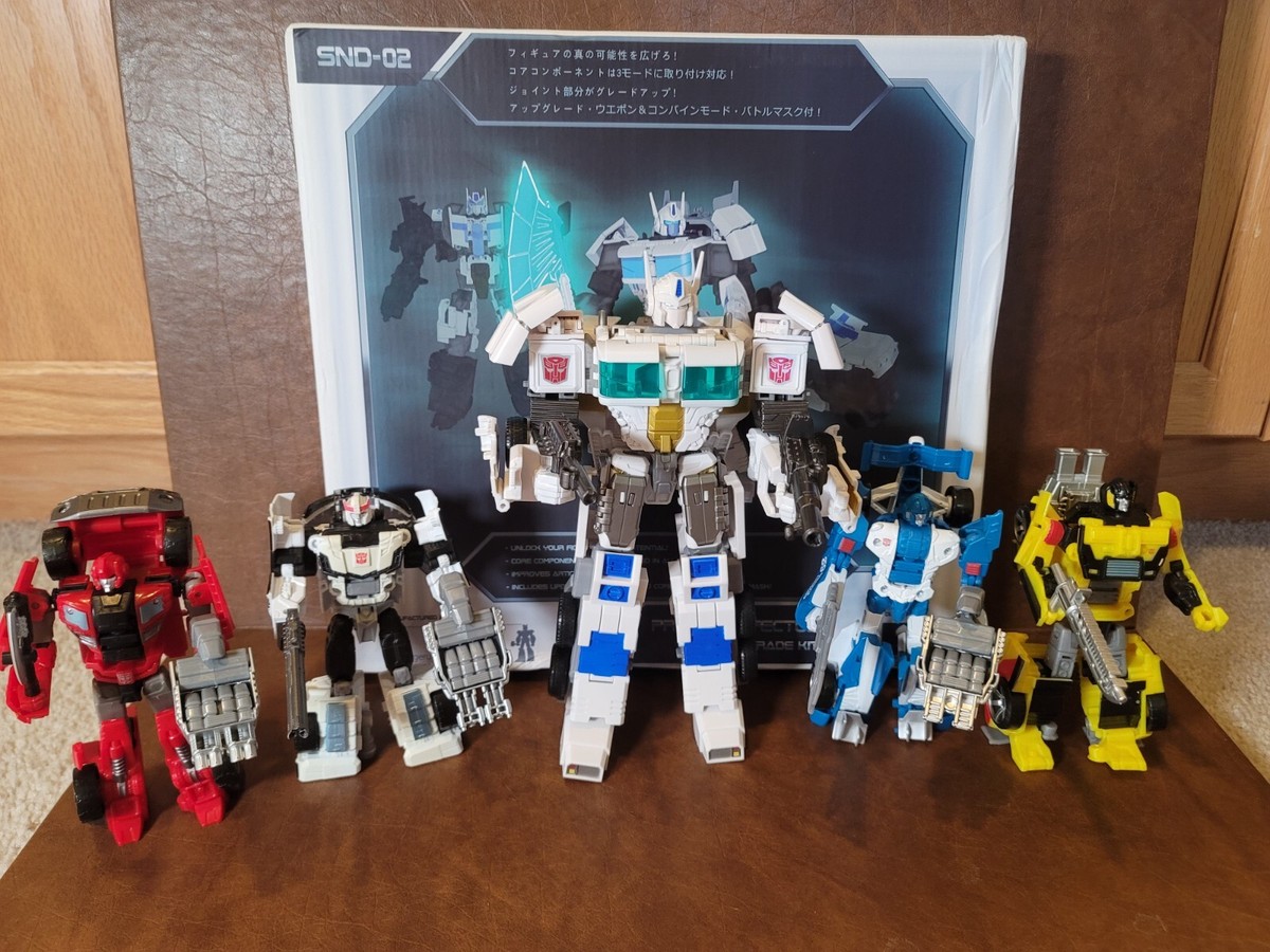 5 Transformers Combiner Wars Optimus Maximus Mirage/Sunstrek