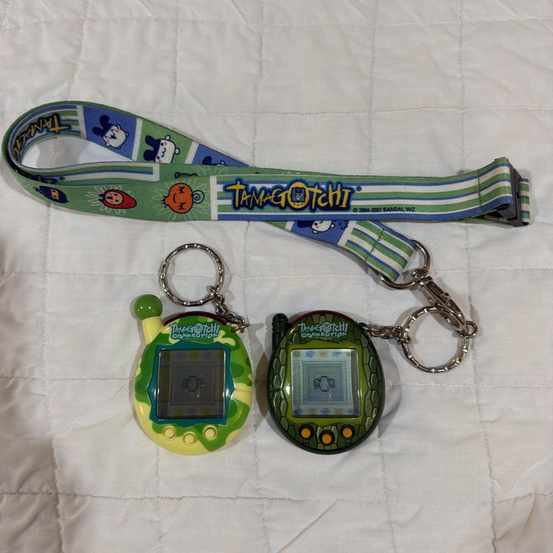 Lot Of 2 Functional Tamagotchi Vintage 2004 and Tamagotchi Lanyard