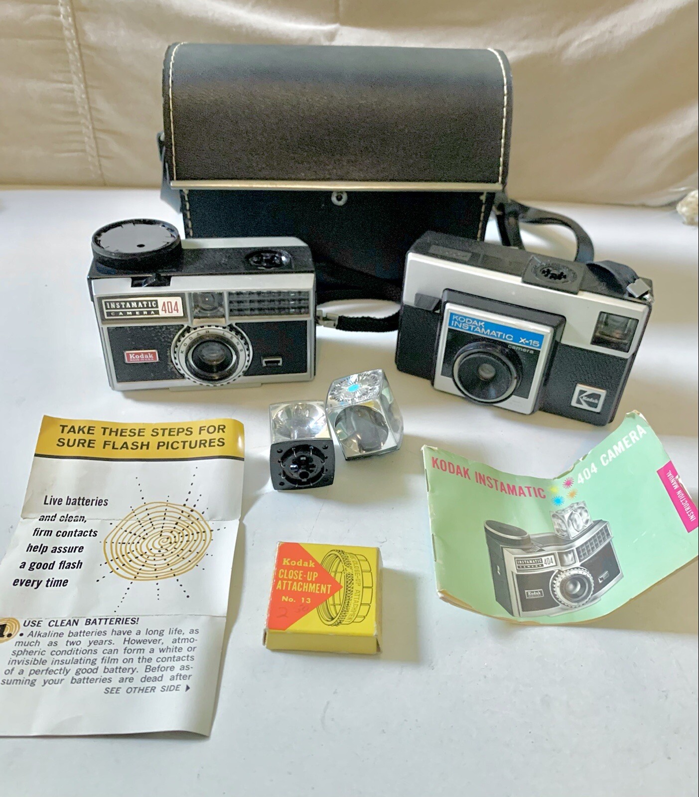 VINTAGE KODAK LOT Of 8  INSTAMATIC CAMERA 404 & X-15  Used And UNTESTED W CASE.