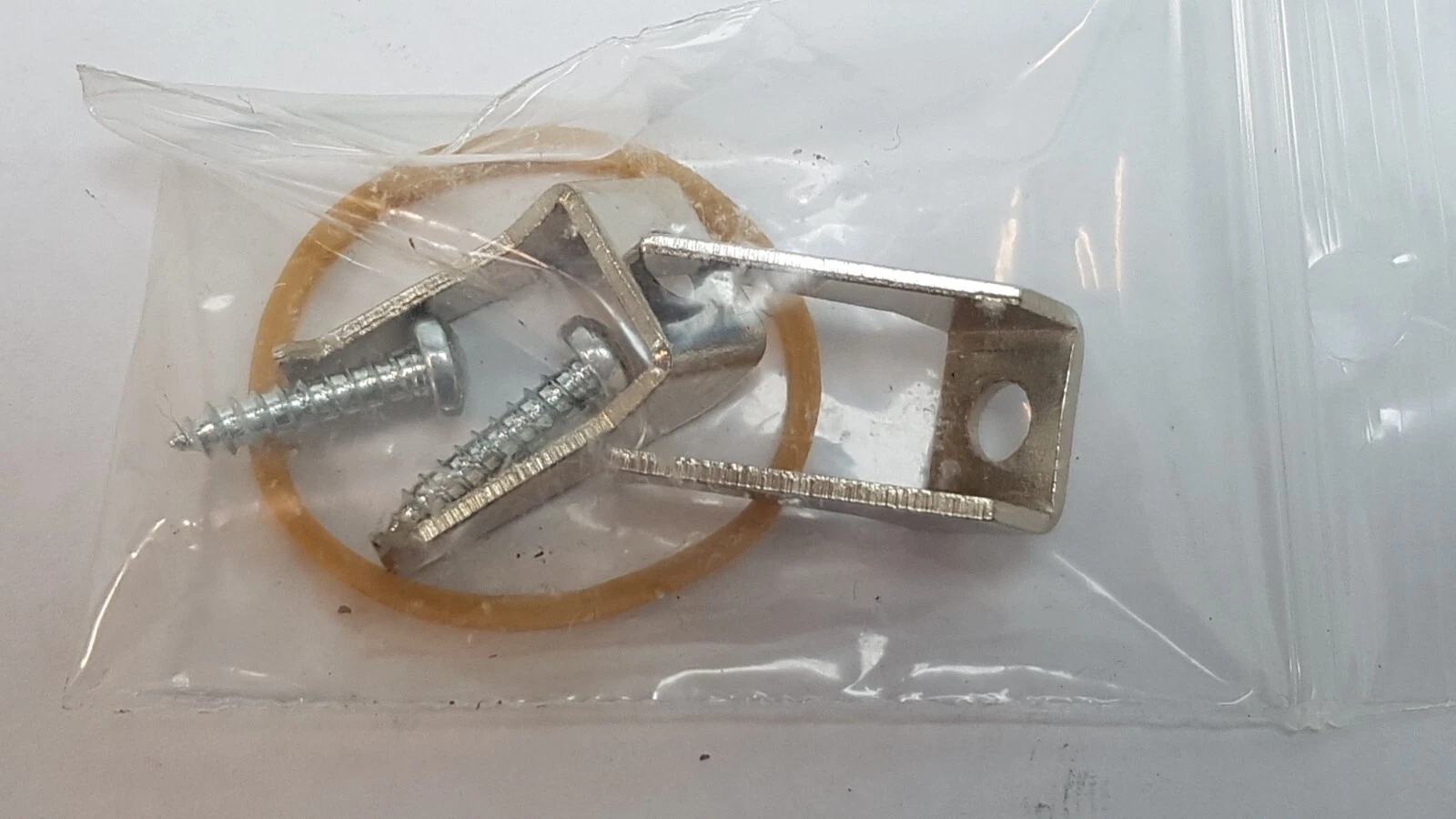 Close-up of the DTDIR03-W fixing claws and screws in their bag