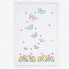 Blossom Blanket - A Stunning Lap Quilt with Vibrant Blooms and Cozy Comfort.