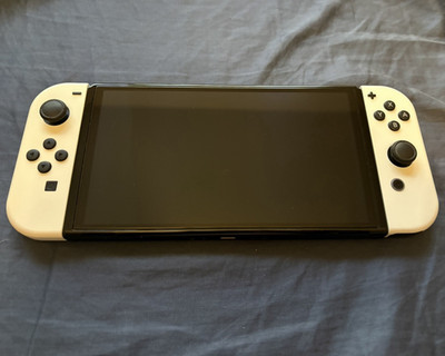 Nintendo Switch OLED Model 64GB Handheld Console White Joy-Con + Cases