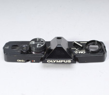 BLACK PAINT OLYMPUS OM-2n TOP COVER W EXPOSURE COMPENSATION KNOB SWITCH DENTS