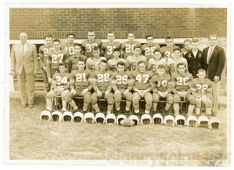1950s High School Football Team Photo Helmets on Grass Coaches Suits