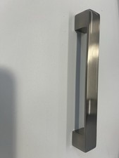 Howdens Kitchen Cupboard Handle D shaped, silver, with fittings.