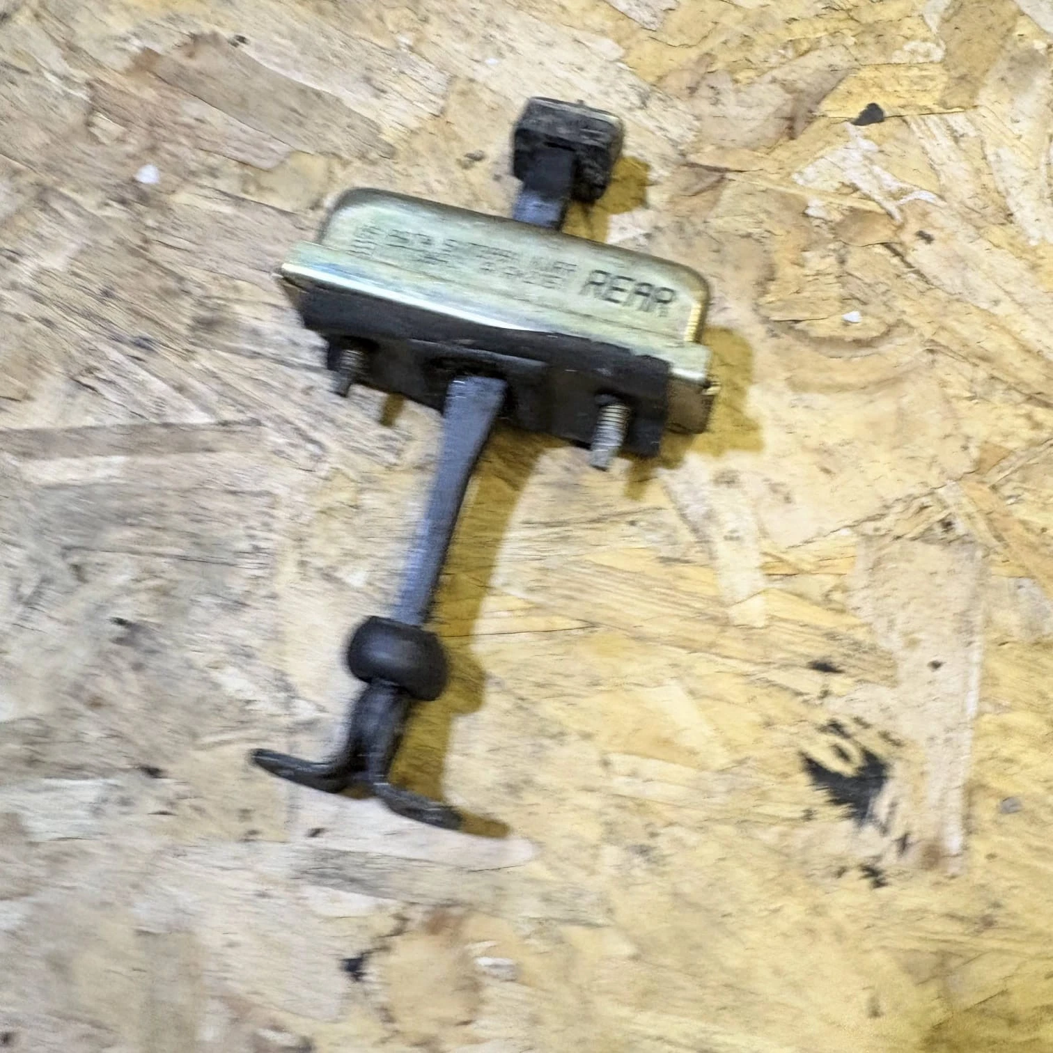 Actual Jeep rear door check arm complete component