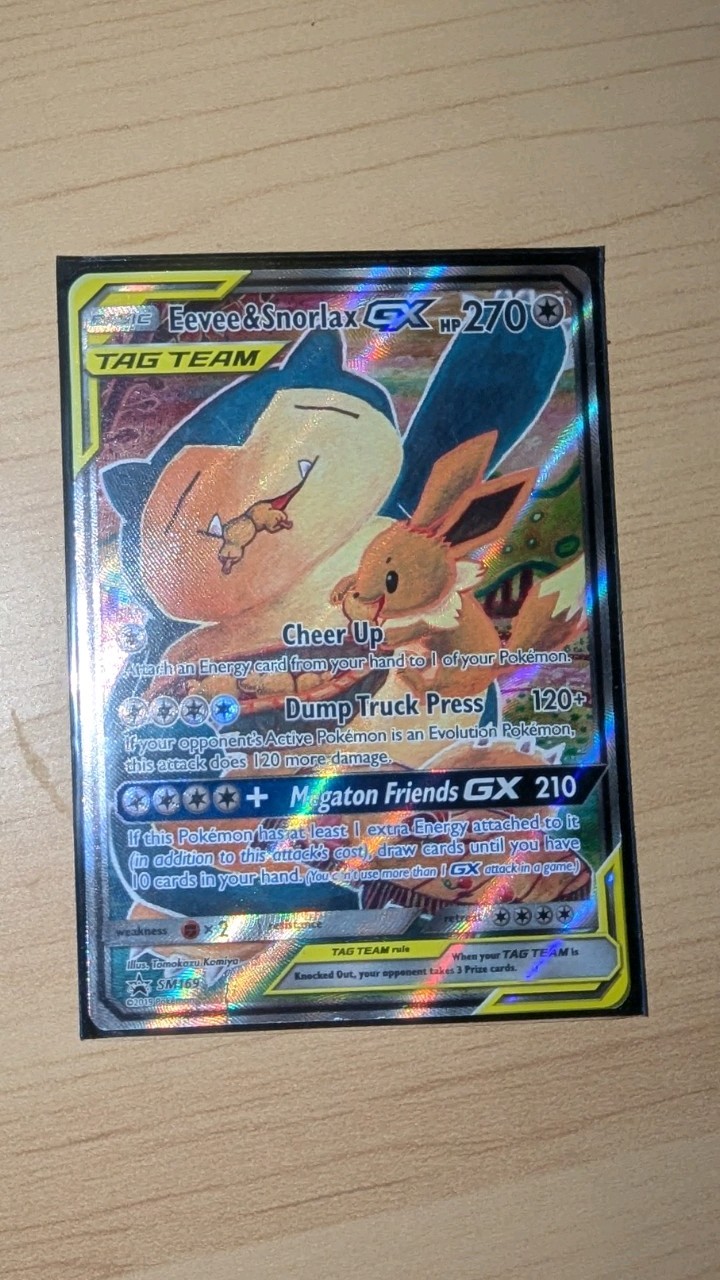 The Pokemon Company Eevee & Snorlax GX SM169 SM Black Star Promo TAG TEAM Holo
