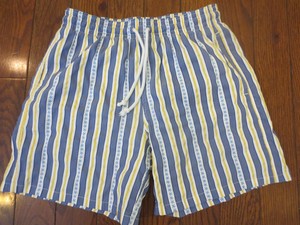 blue and white striped swim trunks