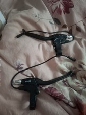 PAIR OF LEFT AND RIGHT WUXING BREAK LEVERS FOR EBIKES ANS SCOOTERS.