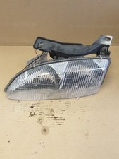 Driver Left Headlight Fits 95-99 Cavalier 155433 Driver Left Headlight Fits 95-99 Cavalier 155433