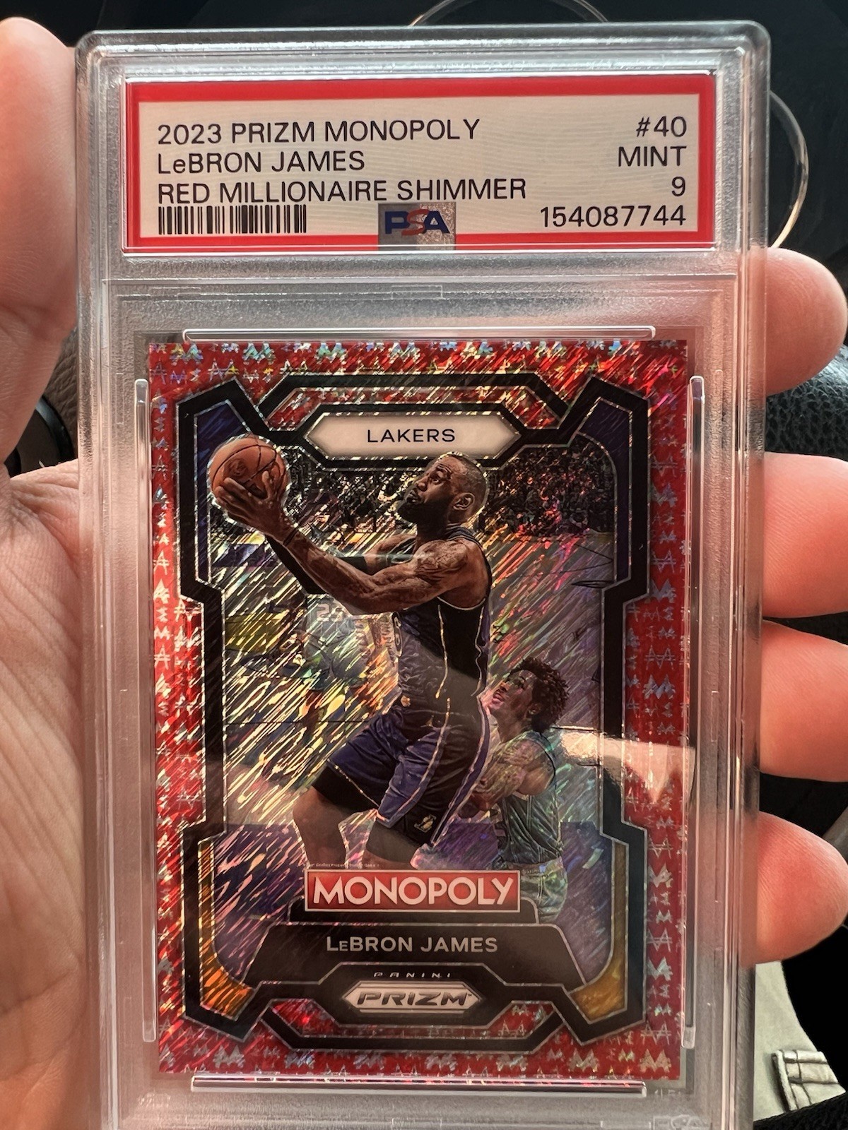 2022-23 Panini Prizm Monopoly LeBron James #40 Red Millionaire Shimmer 001/100 