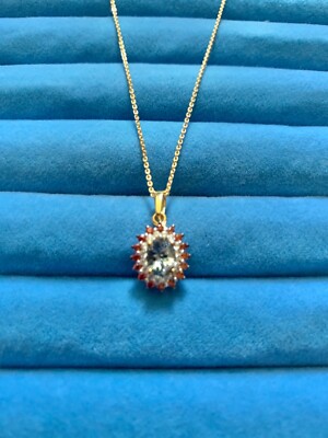 Green Tanzanite, Brown and White Zircon Sunburst Pendant