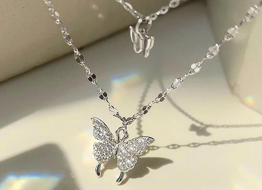 Silver chain with butterfly pendant deals