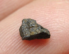 NWA 5415 Achondrite Howardite/Mesosiderite Meteorite - G056-0374 - 0.09g Strange — photo 1