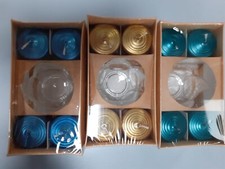 Set 4 candele a moccolo h 4 cm circa con portacandele in vetro , vari colori