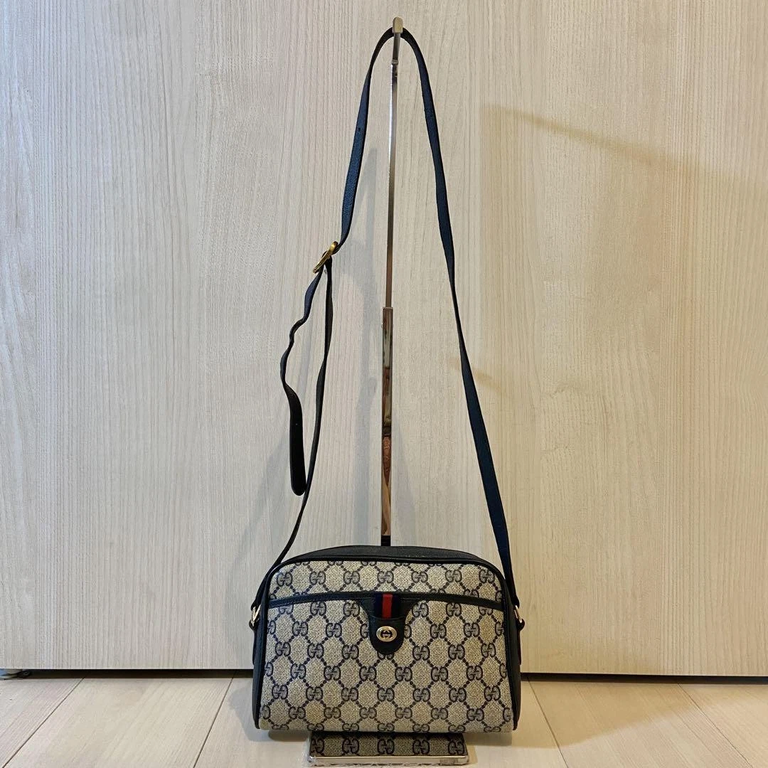 Sac bandoulière Gucci Gg Sherry Line bleu marine cuir détail imbriqué