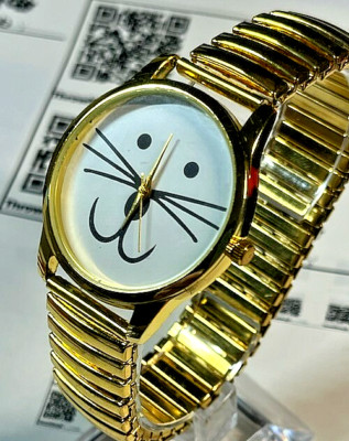cat face Wisker watch, gold tone 35mm running & purring like a kitten.