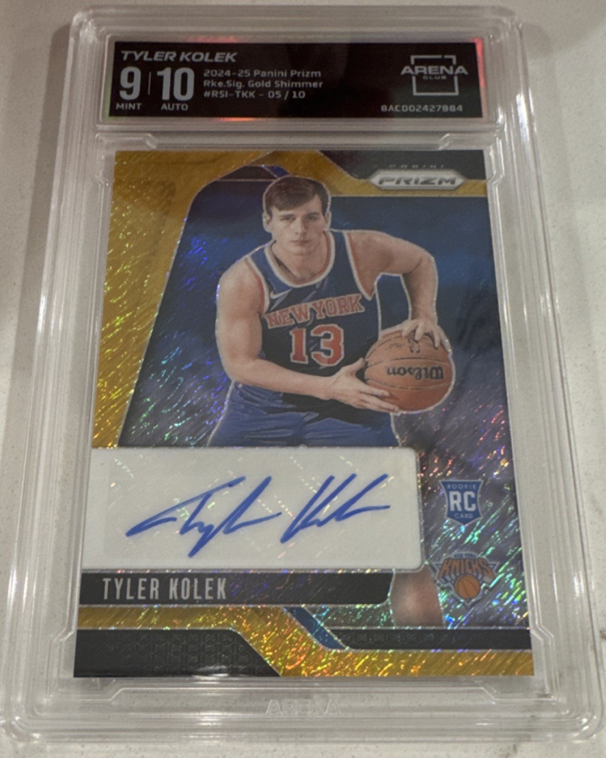2024-25 Panini Prizm Tyler Kolek Gold Shimmer Rookie Auto /10 Knicks RC view 1