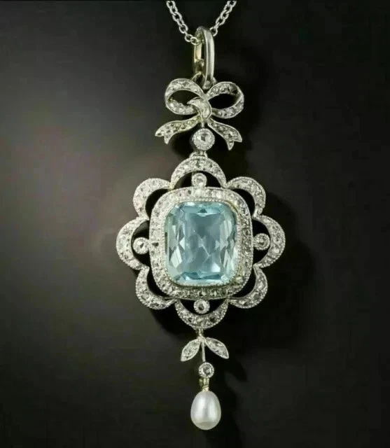 Colgante de halo de aguamarina simulada con cojín de 2,5 quilates enchapado en oro blanco de 14 quilates cadena de 18" Foto 2 de 3