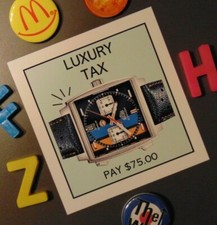 Tag Heuer magnete frigo regalo monopolio orologio lusso Golfo petrolio Monaco corsa