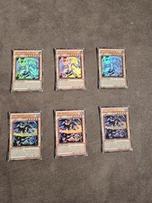 Yu-Gi-Oh Lichtpulsar-Drache / Finstereruptions-Drache x3