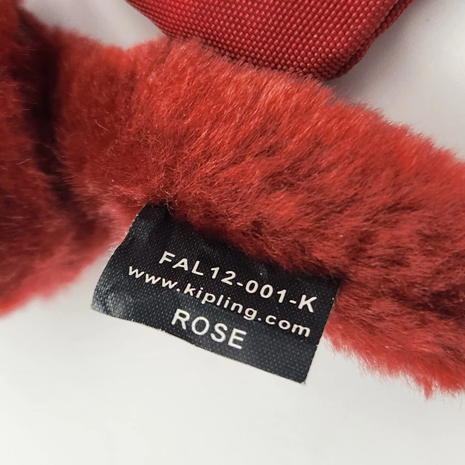 Bolso Clutch Muñequera Kipling Rojo 7" x 4.5" con Llavero Mono Etiqueta Rosa Usado en Excelente Condición Foto 4 de 4