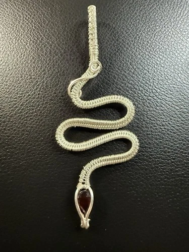 Handcrafted Sterling Silver Snake Pendant with Faceted Garnet