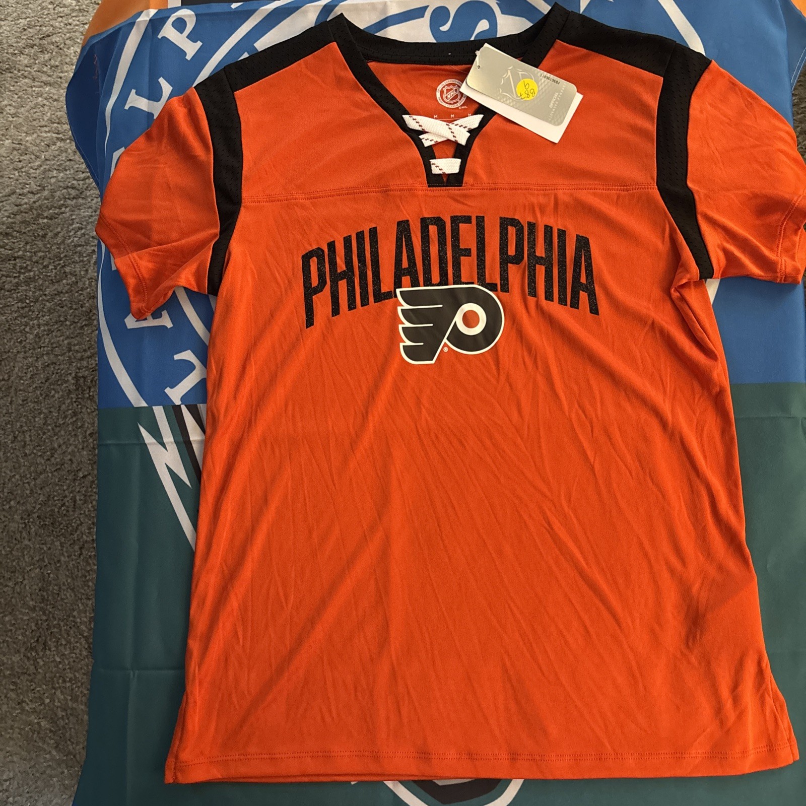 NWT Women’s Medium Philadelphia flyers NHL Brand Lace Neck Shirt