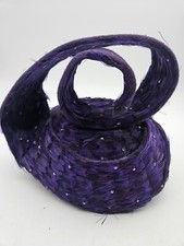 Jack McConnell Purple Feathered Hat Has the Red Feather