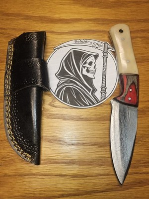 Hand forged Damascus skinner with camel bone handle. S&D special!!